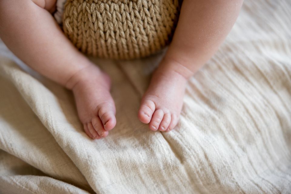 A newborn baby's tiny foot
